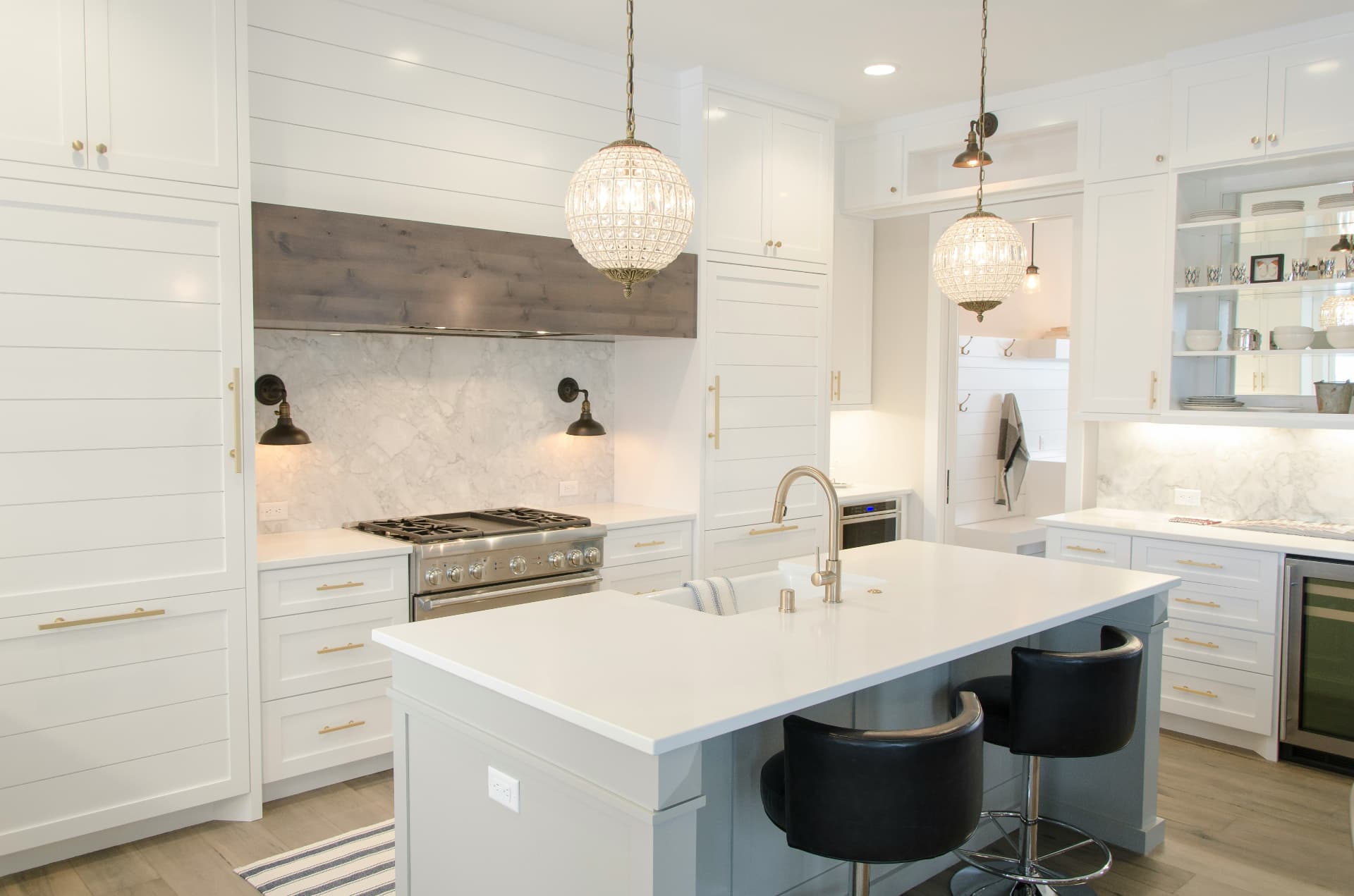Elegant White Kitchen with Globe Lighting